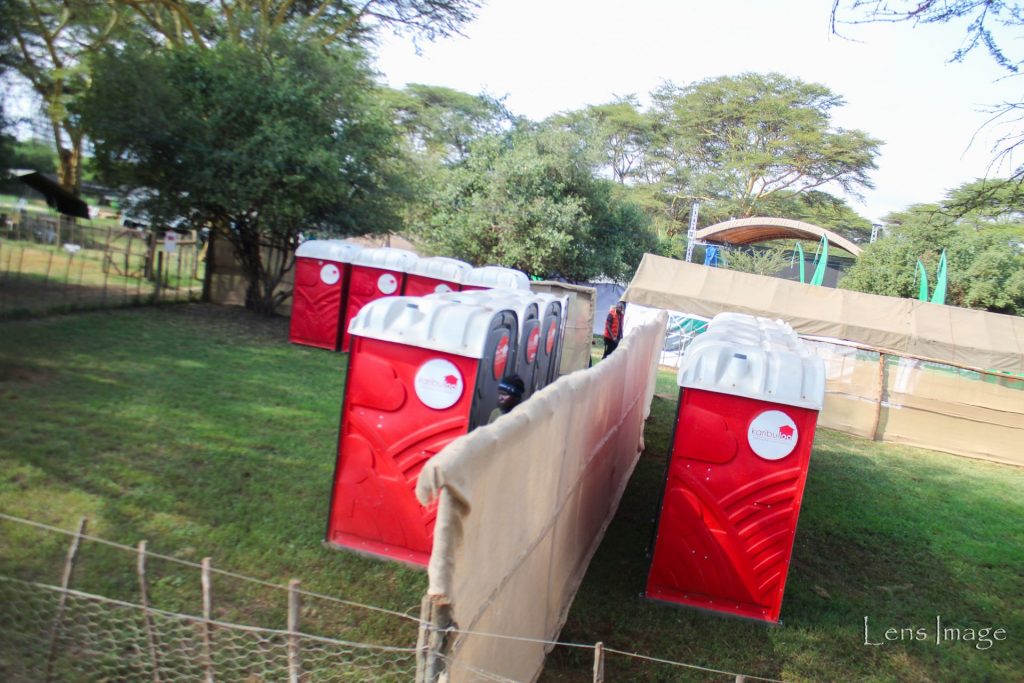 Clean and well-maintained portable toilets, ready to serve attendees at public events with comfort and convenience.